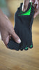 NeuroSox Five Toe Grip Sock shown from behind, displaying ergonomic toe spread and anti-slip sole during balance stance
